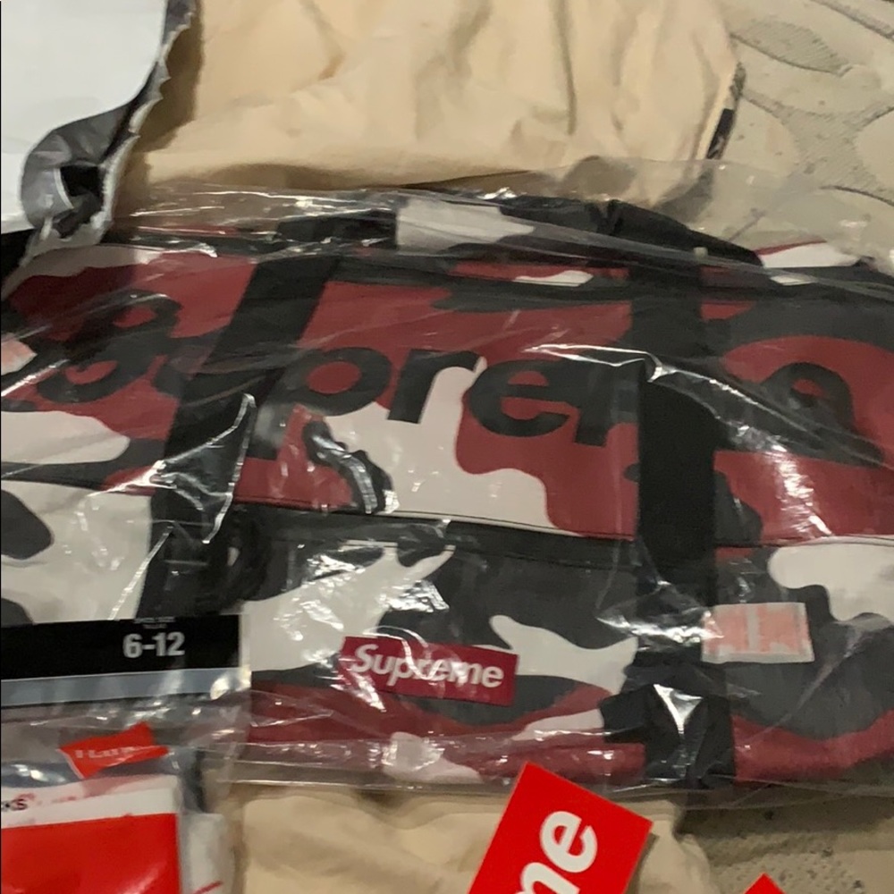 Supreme SS21 Red Camo Duffle Bag